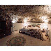 Cave with heated indoor pool and garden