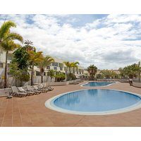 Vacation Apartment 'Obsidian Olivino Miraverde' with Shared Pool Wi-Fi and Air Conditioning