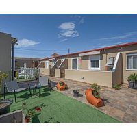 Vacation Apartment '2 Omanai Tenerife Sur' with Private Terrace Shared Garden and Wi-Fi