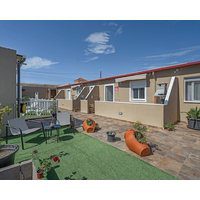 Vacation Apartment '3 Apartamentos Omanai Tenerife Sur' with Shared Garden and Wi-Fi